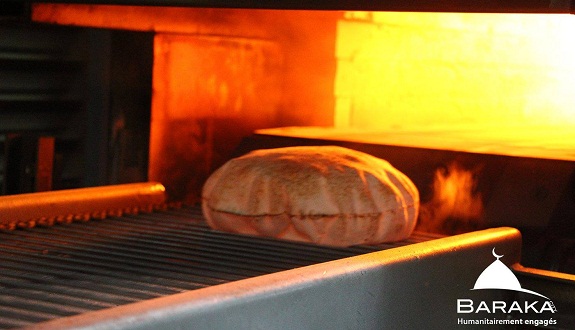 جمعية بركة سيتي تمنح السوريين مخبرة متنقلة قادرة على إنتاج 35000 خبزة يوميا